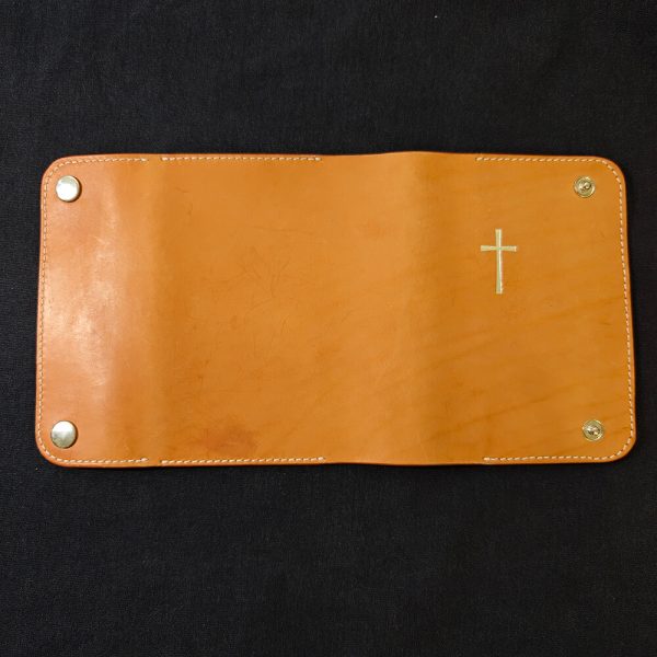 leather bible cover double closure black background backside